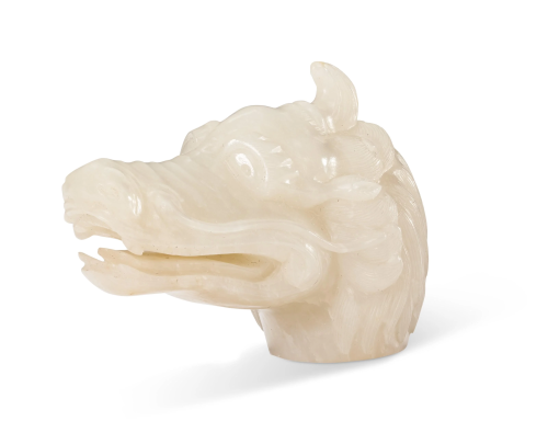 A WHITE JADE DRAGON-HEAD FINIAL