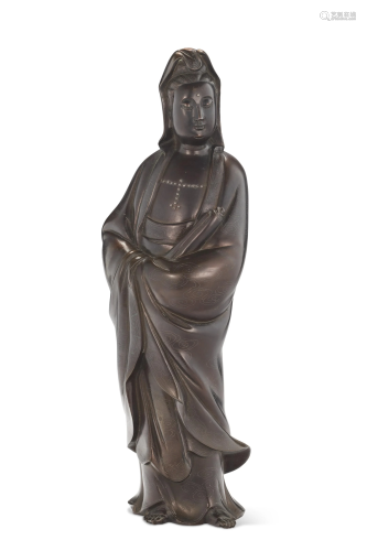 A LARGE SILVER-INLAID BRONZE FIGURE OF GUANYIN