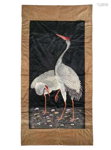 AN EMBROIDERED 'CRANES AND LOTUS' SILK PANEL Likely Japan, M...