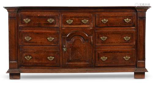 AN OAK AND BURR ELM CROSSBANDED DRESSER BASE, MID 18TH CENTU...