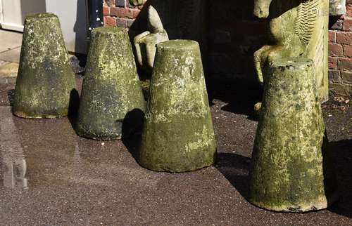 A SET OF FOUR PORTLAND STONE DRIVEWAY MARKERS, 19TH CENTURY