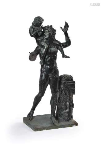 AFTER THE ANTIQUE, A BRONZE GROUP OF A SATYR WITH THE INFANT...