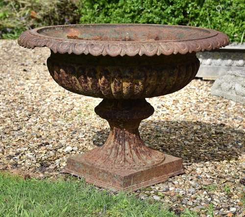 A PAIR OF VICTORIAN CAST IRON GARDEN URNS, BY THOMAS BRADFOR...