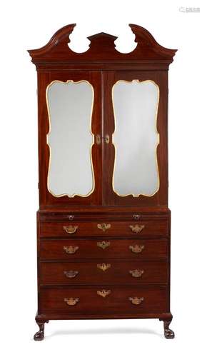 AN IRISH GEORGE II MAHOGANY SECRETAIRE CABINET IN THE MANNER...