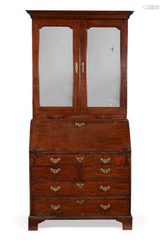 A GEORGE II MAHOGANY AND CROSSBANDED BUREAU CABINET, CIRCA 1...