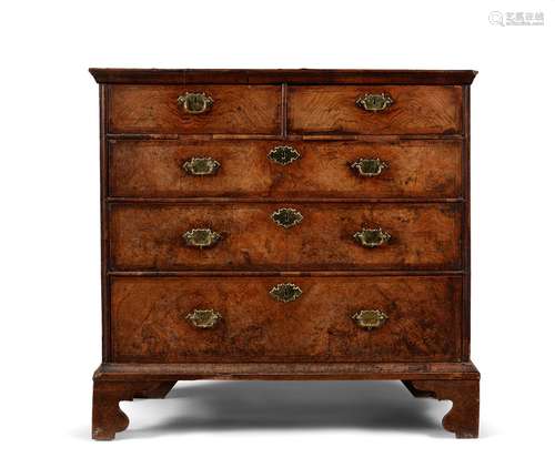 A GEORGE II WALNUT AND FEATHER BANDED CHEST OF DRAWERS, CIRC...