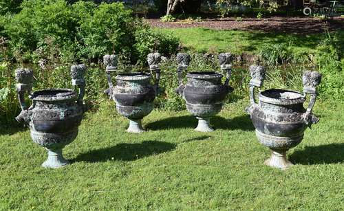 A SET OF FOUR BRONZE 'VERSAILLES' VASES, AFTER THE DESIGN BY...