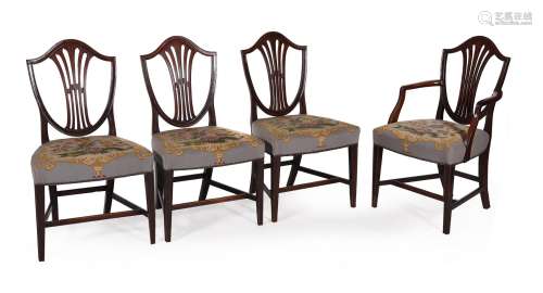 A SET OF EIGHT GEORGE III MAHOGANY DINING CHAIRS, CIRCA 1790