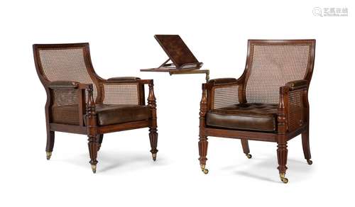 A NEAR PAIR OF REGENCY MAHOGANY BERGERE LIBRARY ARMCHAIRS, C...