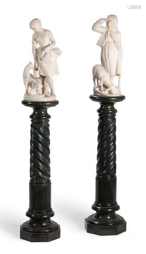 A PAIR OF CARVED ALABASTER FIGURES ON MARBLE STANDS, 19TH CE...