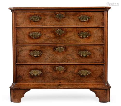 A GEORGE II WALNUT CHEST OF DRAWERS, CIRCA 1740