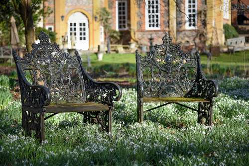 A PAIR OF BLACK PAINTED CAST IRON GARDEN SEATS, SECOND HALF ...