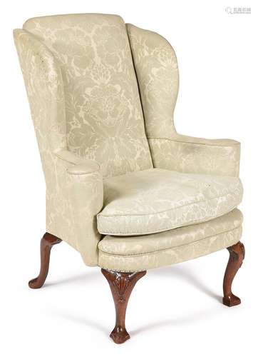 A GEORGE II WALNUT WING ARMCHAIR, CIRCA 1740