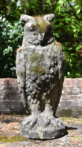 A PAIR OF COMPOSITION STONE OWLS, 20TH CENTURY