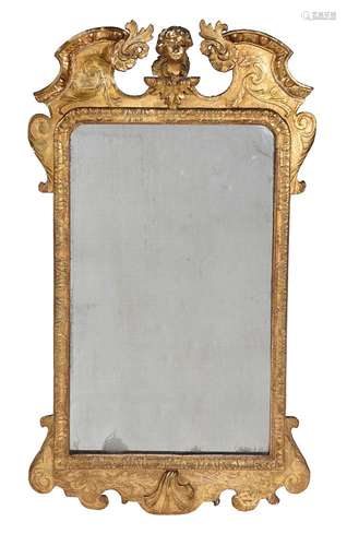 A GEORGE I GILTWOOD WALL MIRROR, CIRCA 1720