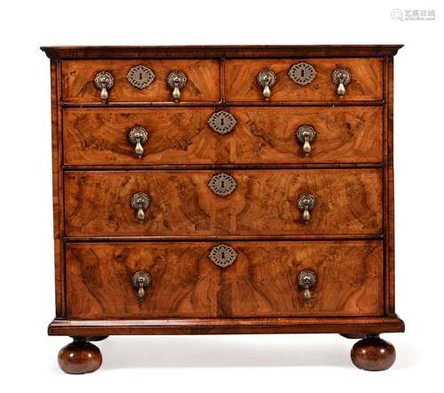 A WILLIAM III WALNUT AND FEATHERBANDED CHEST OF DRAWERS, CIR...