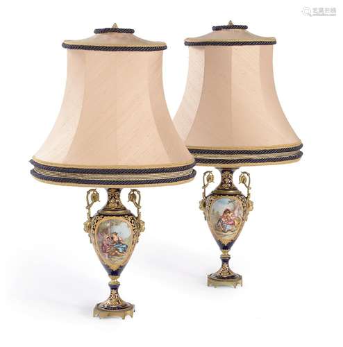 A PAIR OF SEVRES STYLE GILT METAL MOUNTED TWO-HANDLED VASES,...