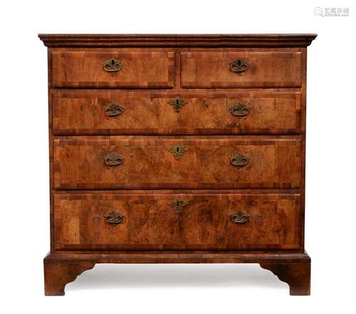 A GEORGE I WALNUT, ELM, AND FRUITWOOD CROSSBANDED CHEST OF D...