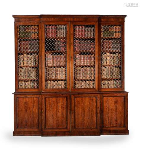 Y A REGENCY ROSEWOOD AND BRASS MOUNTED BREAKFRONT LIBRARY BO...