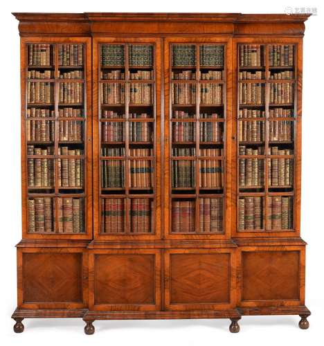 A WALNUT AND SEAWEED MARQUETRY BREAKFRONT BOOKCASE, 20TH CEN...
