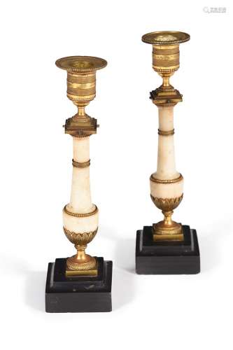 A PAIR OF GEORGE III WHITE MARBLE AND GILT METAL MOUNTED CAN...