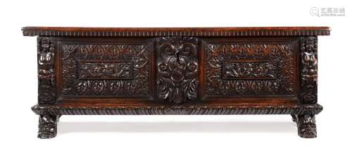 AN ITALIAN CARVED WALNUT CASSONE, LATE 17TH/EARLY 18TH CENTU...