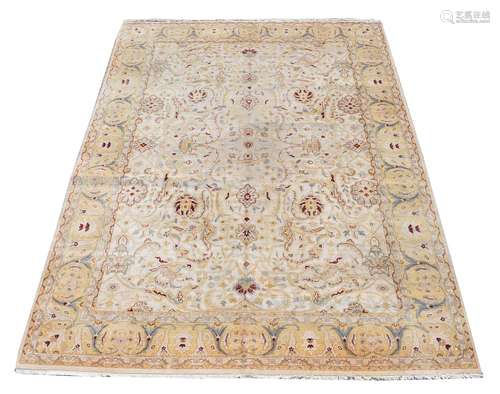 A WOVEN CARPET, IN THE AGRA STYLE, approximately 368 x 270cm