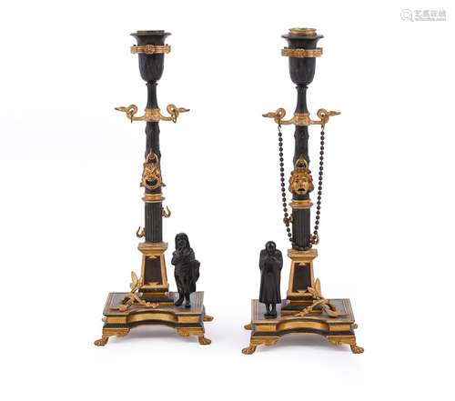 A PAIR OF FRENCH BRONZE AND PARCEL GILT CANDLESTICKS, CIRCA ...