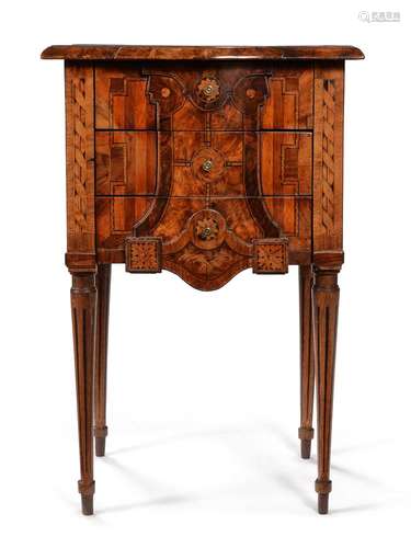 A CONTINENTAL WALNUT AND INLAID PETITE COMMODE, CIRCA 1780