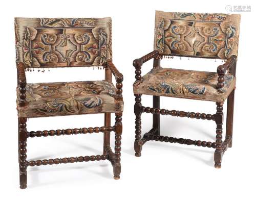A SET OF FOUR WALNUT AND NEEDLEWORK UPHOLSTERED CHAIRS, CIRC...