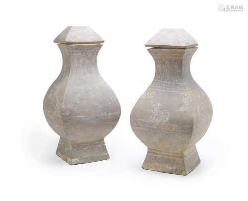 A GOOD LARGE PAIR OF CHINESE POTTERY VASES AND COVERS, HAN D...