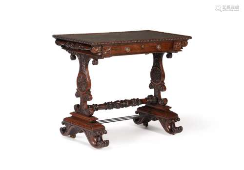 AN ANGLO INDIAN CARVED MAHOGANY WRITING TABLE, CIRCA 1825