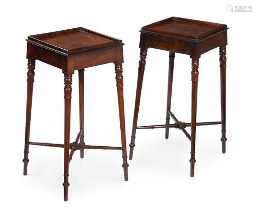 A PAIR OF GEORGE III MAHOGANY URN STANDS, CIRCA 1810