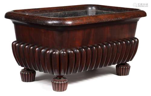 A GEORGE IV MAHOGANY WINE CISTERN, CIRCA 1825, IN THE MANNER...