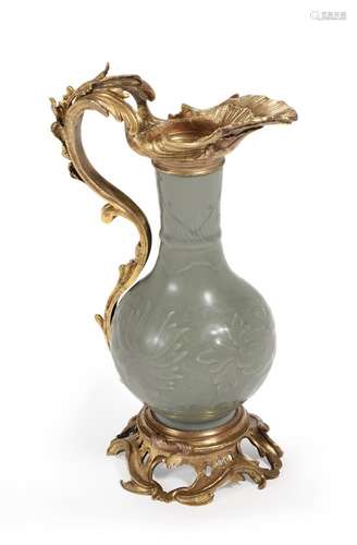 AN ORMOLU MOUNTED CHINESE CELADON PORCELAIN EWER, 19TH CENTU...