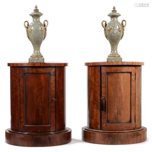 A PAIR OF GEORGE IV MAHOGANY CYLINDRICAL BEDSIDE OR PEDESTAL...