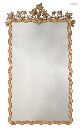 AN ITALIAN GILTWOOD AND COMPOSITION WALL MIRROR, MID 19TH CE...