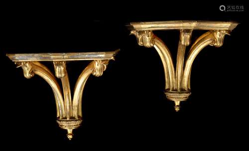 A PAIR OF CARVED GILTWOOD AND GESSO WALL BRACKETS, IN GEORGE...