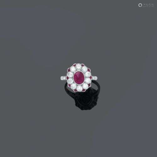 BAGUE RUBIS ET DIAMANT, vers 1920.Platine 950, 5g. Bague déc...