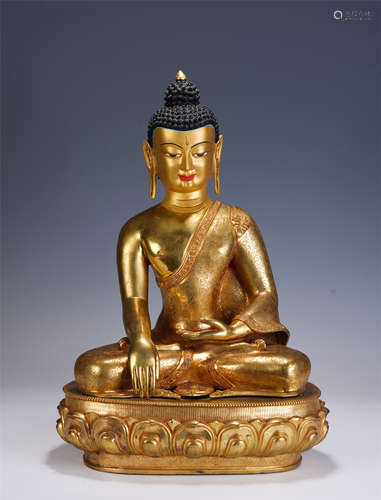 A CHINESE BRONZE GILT STATUETTE OF SAKYAMUNI