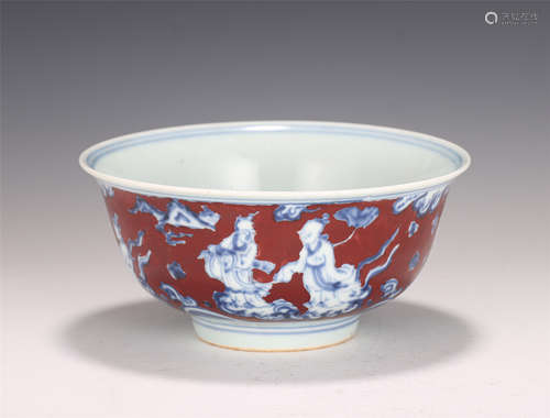 A CHINESE IRON-RED GROUND BLUE AND WHITE PORCELAIN BOWL