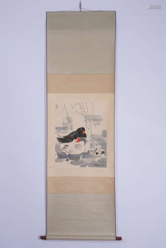 A CHINESE PAINTING OF WHITE AND BLACK DUCKS