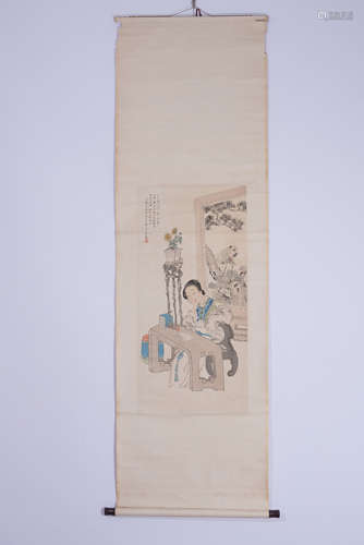 A CHINESE SCROLL PAINTING OF LADY