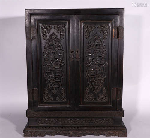 A CHINESE CARVED ZITAN WOOD BUDDHA CABINET