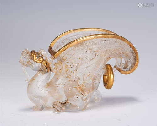 A CHINESE GILT MOUNTED CRYSTAL MYTHICAL BEAST