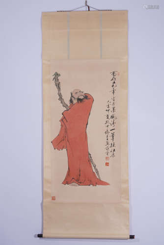 A CHINESE SCROLL PAINTING OF FIGURE