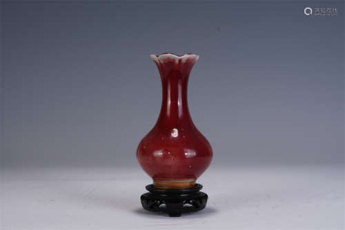 A CHINESE RED GLAZED PORCELAIN VASE