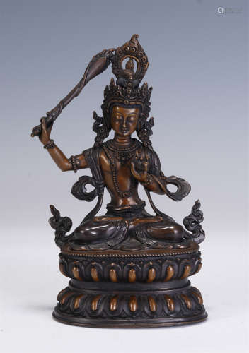 A NEPALESE STYLE ALLOY COPPER STATUETTE OF BUDDHA