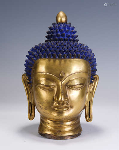 A CHINESE GILT BRONZE BUDDHA HEAD