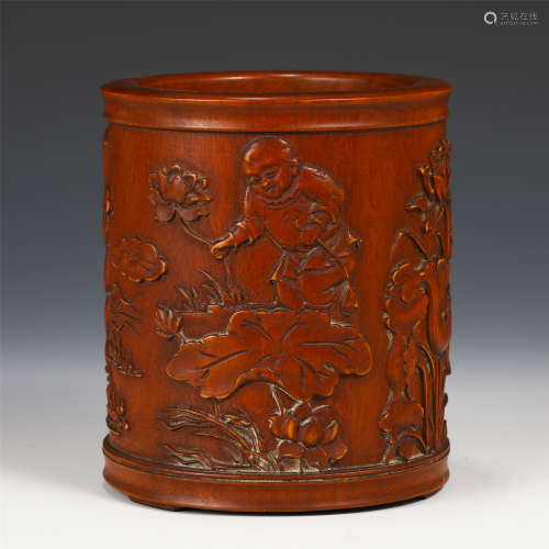 A CHINESE CARVED HARDWOOD LOTUS-AND-KIDS BRUSH POT